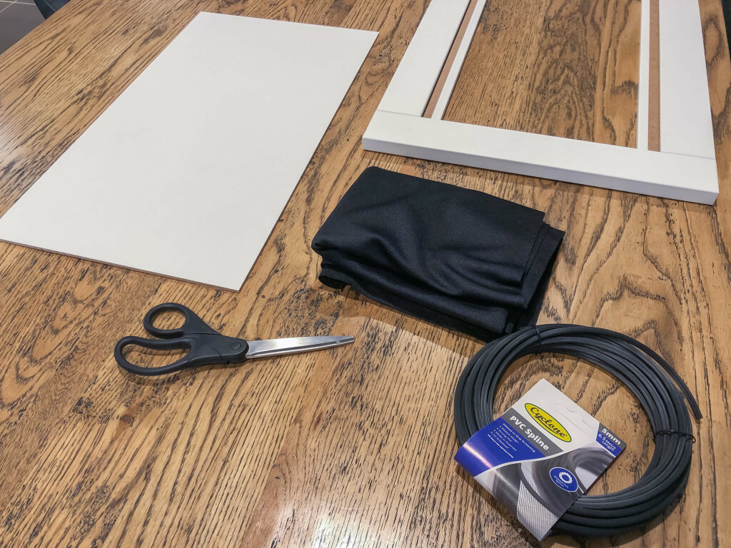 Disassembled HANVIKEN door, speaker fabric and PVC spline