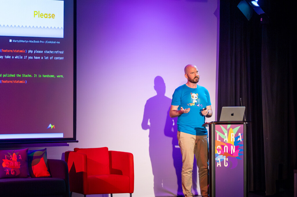 Marty Friedel speaking about Statamic's "please" command at Laracon AU 2023