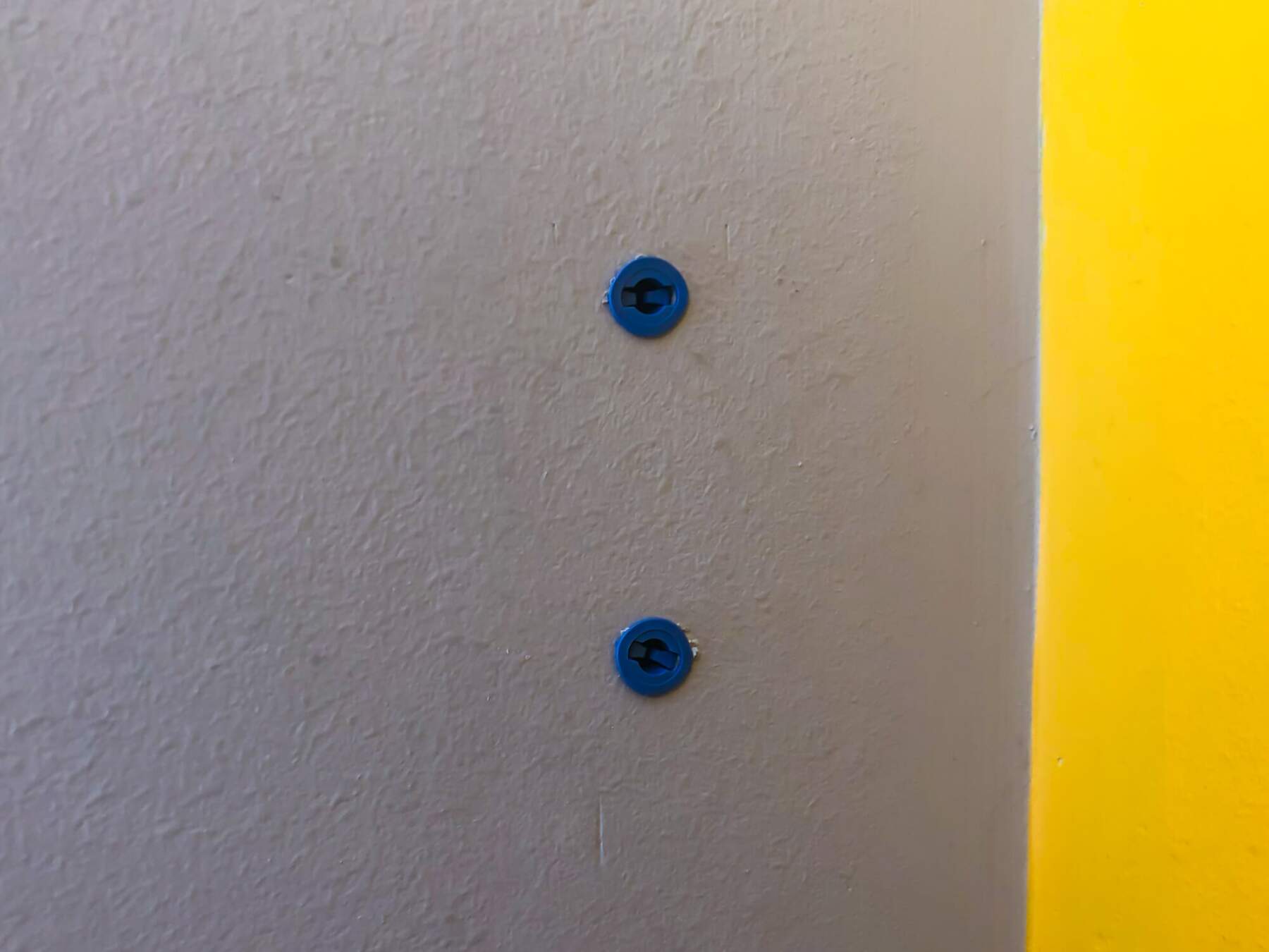 Holes drilled, and wall plugs installed